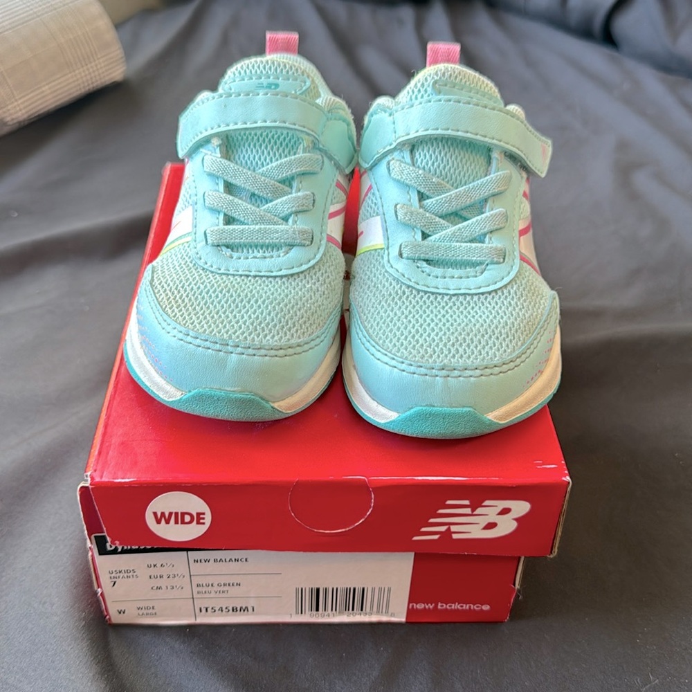 Multi color new balance toddler shoe